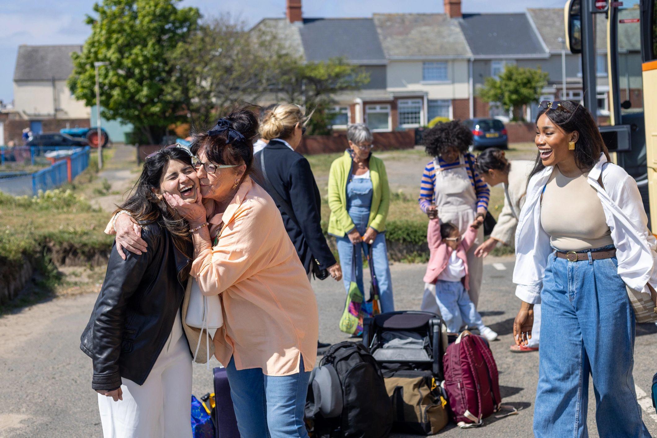 Emotional public moment captured outdoors for human-interest news coverage