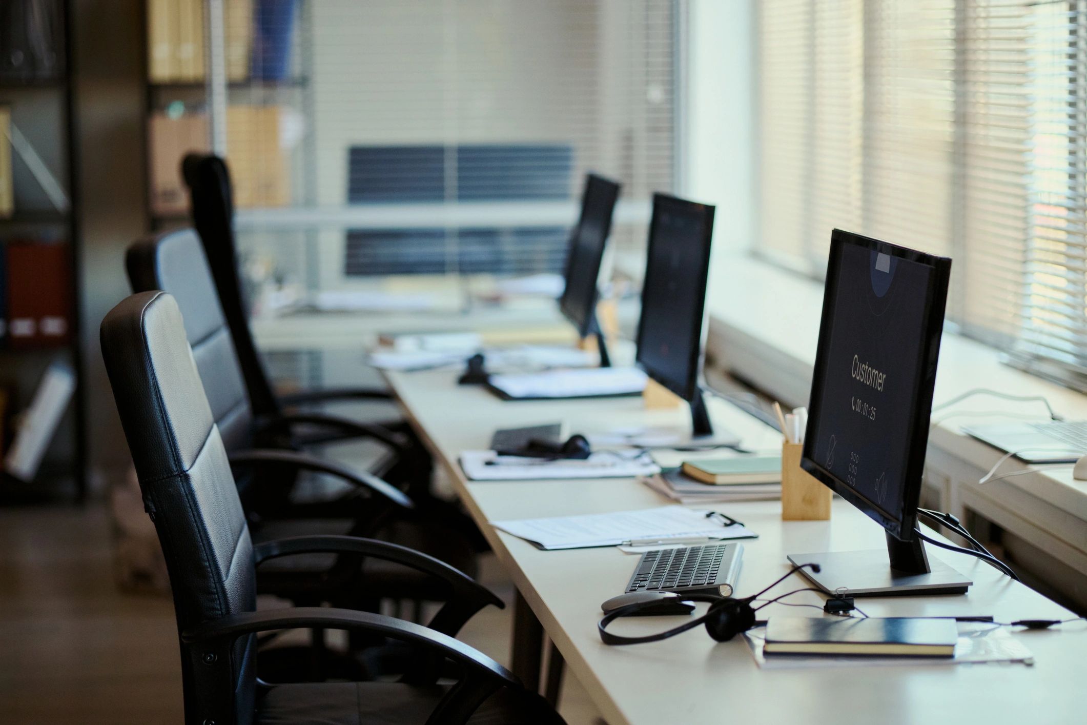 Office workstations symbolizing digital news platform access and operations