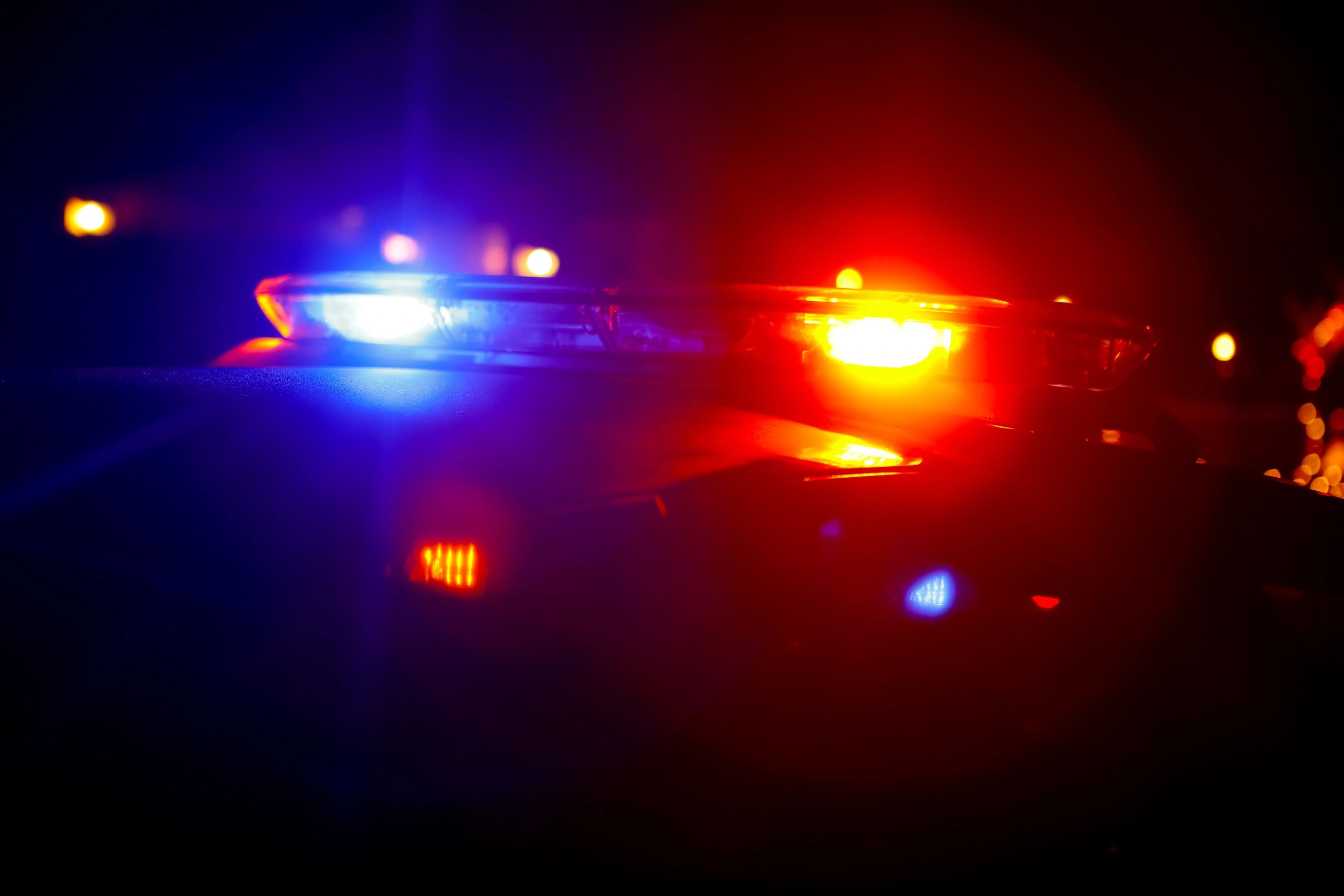 Police vehicle lights for breaking incident coverage